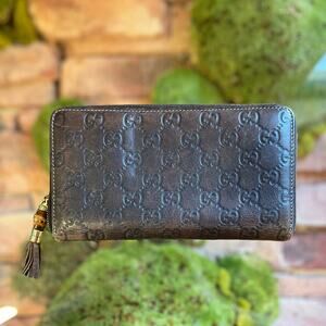 GUCCI Guccissima Bamboo Tassel Aged Leather Zip Around Wallet